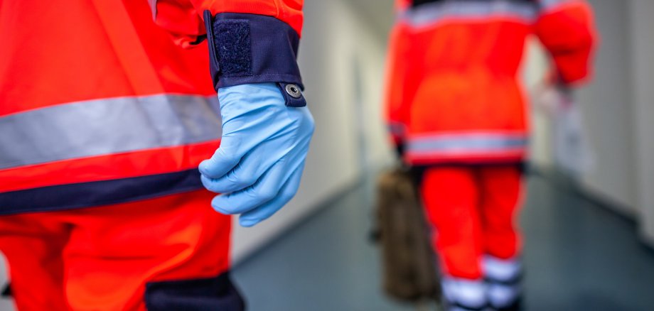 German paramedic runs in a floor to an accident German paramedic runs in a floor to an accident